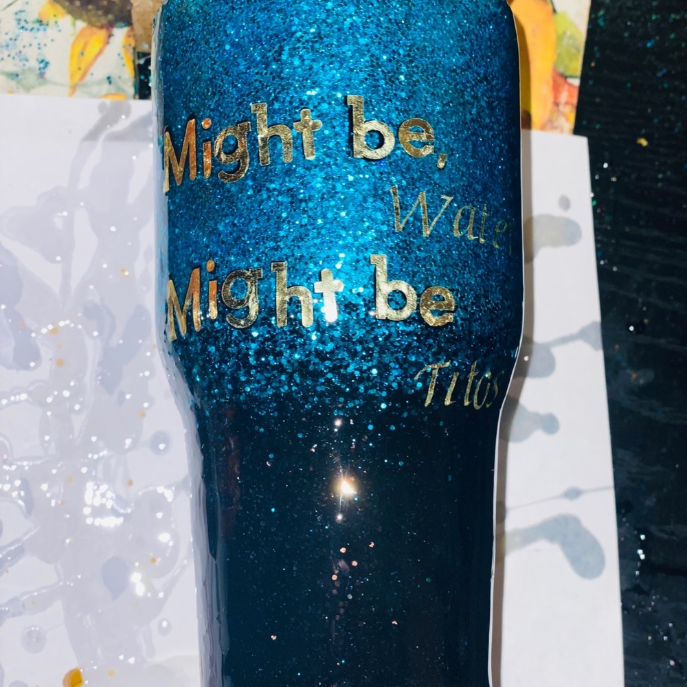 Might be water might be Tito’s custom 30oz tumbler